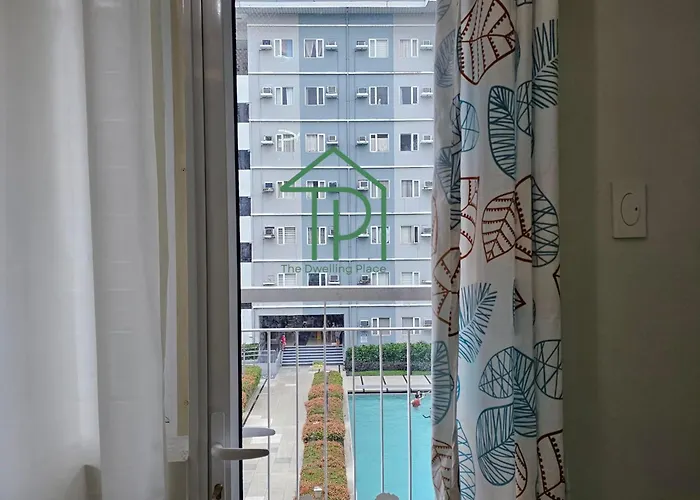 1br Pool Front View Balcony Near Sm Fairview By Tdp Staycation